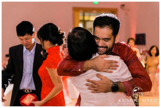 Groom Hugging Mother In Law | California Center for the Arts Escondido Wedding Photo | © Kristine Marie Photography