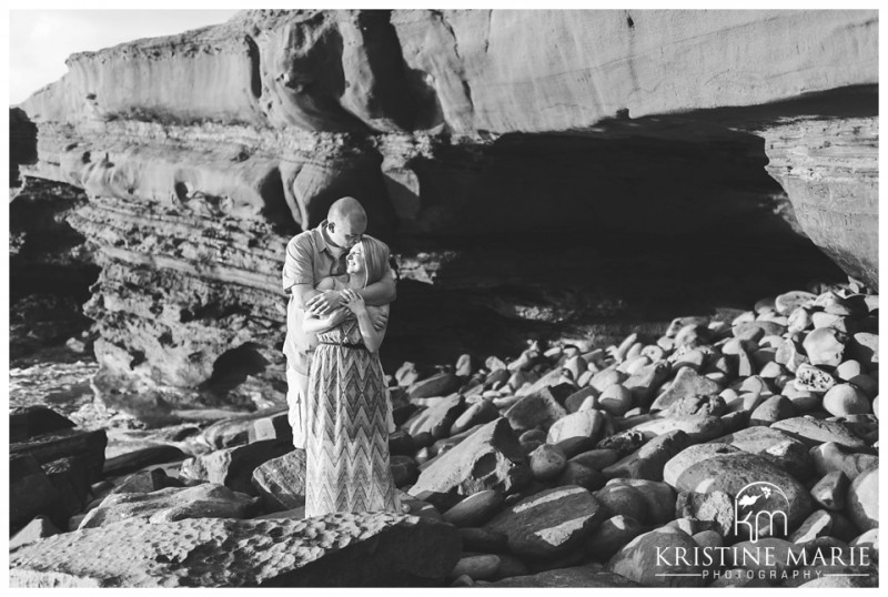 Couple Kissing by the Cave | La Jolla Cove Beach Engagement Photo | San Diego Engagement Wedding Photographer | Kristine Marie Photography © www.kristinemariephotography.com (3)
