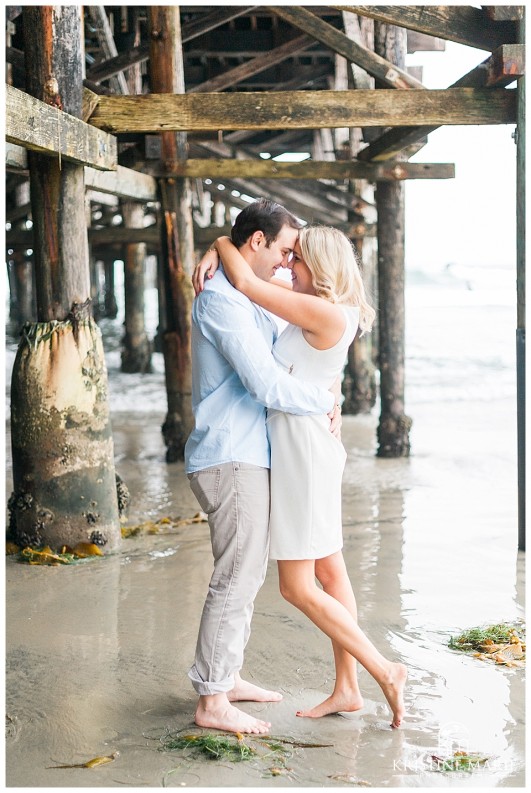 Romantic Pier Beach Engagement Photo  Pacific Beach San Diego Engagement Photographer | Kristine Marie Photography | © www.kristinemariephotography.com