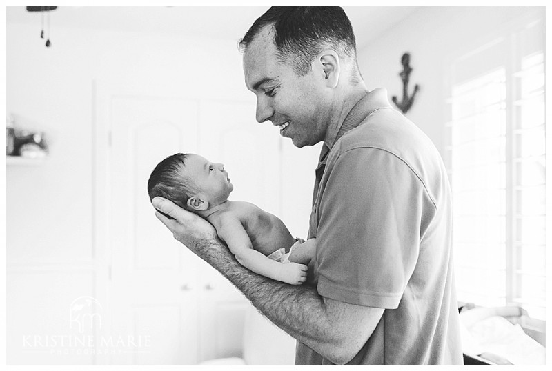 New Dad Holding Newborn Baby Son Photo | | San Diego Newborn Baby Photographer | Kristine Marie Photography © www.kristinemariephotography.com