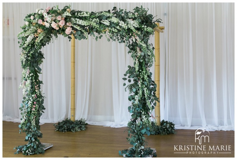 Gorgeous Floral Arch Wedding Ceremony | Florals by Cherry Blossom Floral Design | Photo by Kristine Marie Photography | San Diego Wedding Photographer | Heritage Hall Magee Park Carlsbad Wedding | © www.kristinemariephotography.com