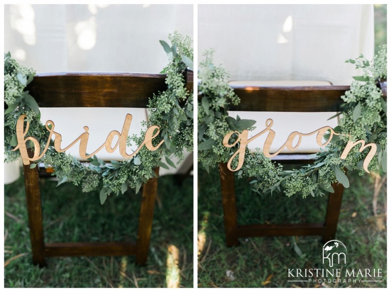 Bride and Groom Wooden Sign Sweetheart Table Chairs | Dinner Table Decor | | Photo by Kristine Marie Photography | San Diego Wedding Photographer | Heritage Hall Magee Park Carlsbad Wedding | © www.kristinemariephotography.com