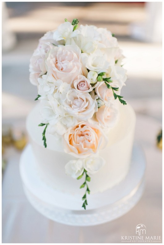 All-White Wedding Cake with Blush Pink Floral Topper | Photo by Kristine Marie Photography | San Diego Wedding Photographer | Heritage Hall Magee Park Carlsbad Wedding | © www.kristinemariephotography.com