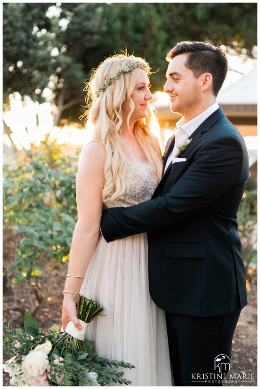 Sunset Photo Bride and Groom with Floral Crown | Dinner Table Decor | | Photo by Kristine Marie Photography | San Diego Wedding Photographer | Heritage Hall Magee Park Carlsbad Wedding | © www.kristinemariephotography.com