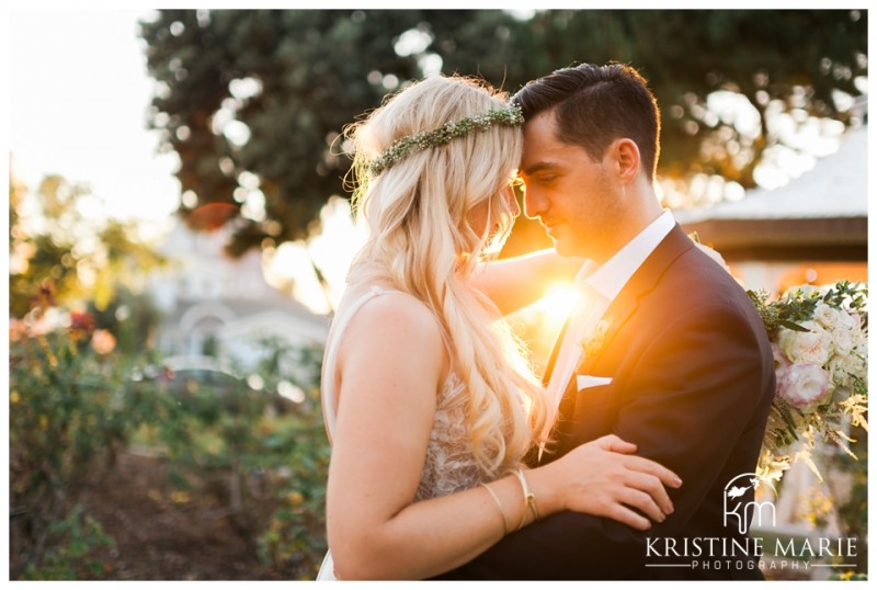 Backlit Sunset Photo Bride with Floral Crown with Groom | Dinner Table Decor | | Photo by Kristine Marie Photography | San Diego Wedding Photographer | Heritage Hall Magee Park Carlsbad Wedding | © www.kristinemariephotography.com