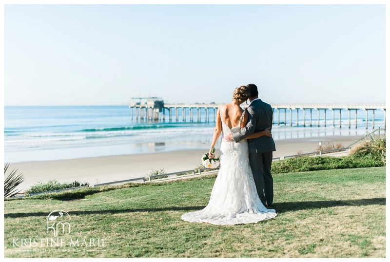 Scripps pier bride and groom photo | Scripps Seaside Forum Wedding | La Jolla San Diego Wedding Photographer | Kristine Marie Photography | © www.kristinemariephotography.com