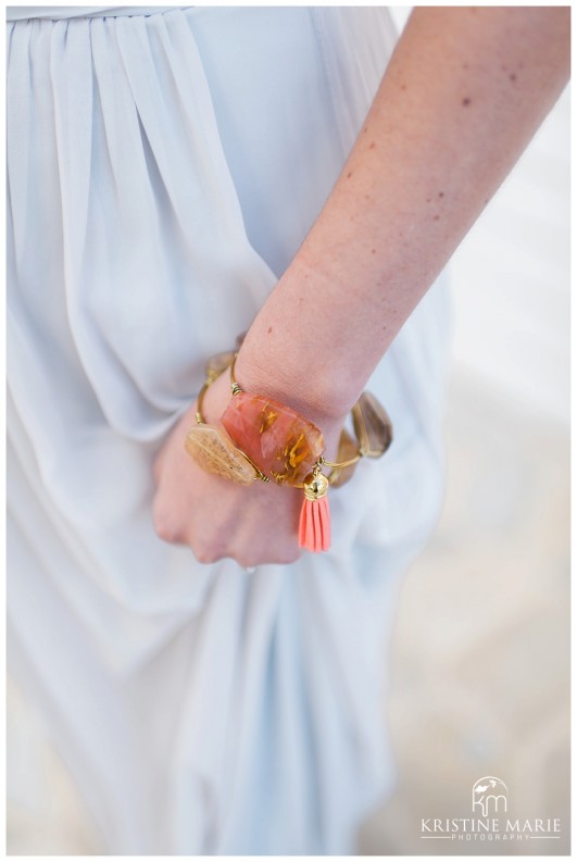 Bridesmaid coral and gold bracelet | Scripps Seaside Forum Wedding | La Jolla San Diego Wedding Photographer | Kristine Marie Photography | © www.kristinemariephotography.com