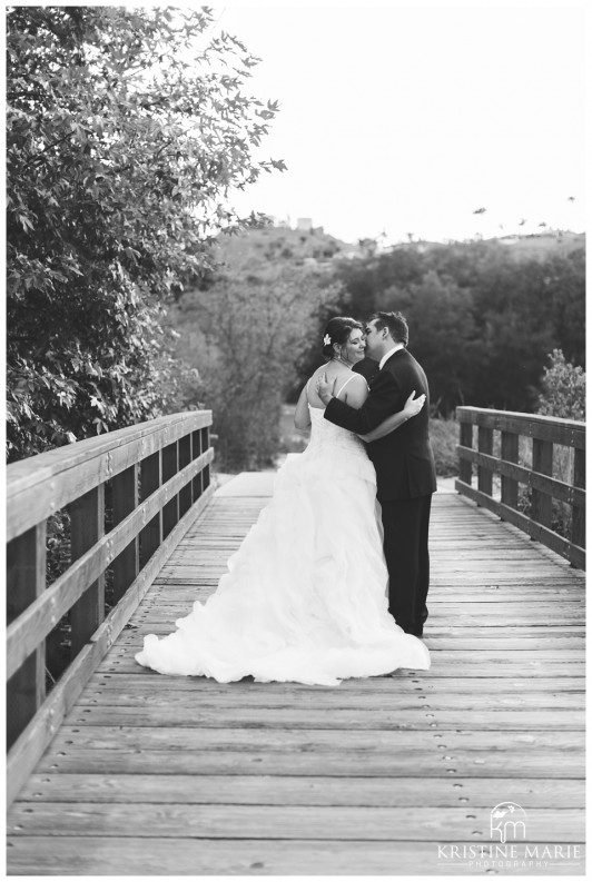 Groom Kissing Bride on Bridge | Maderas Golf Club | Poway San Diego Wedding Photographer | Kristine Marie Photography | © www.kristinemariephotography.com