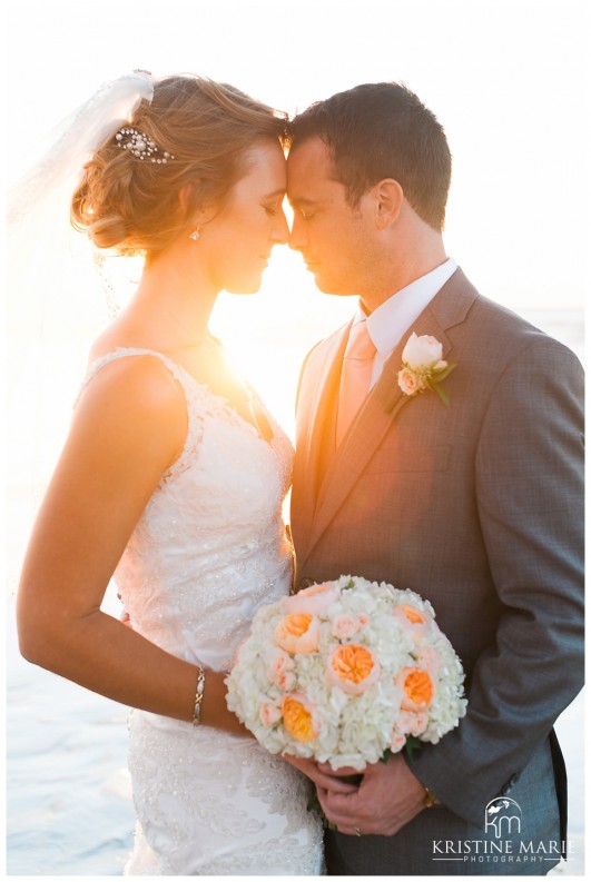 sunset bride groom romantic photo | Scripps Seaside Forum Wedding | La Jolla San Diego Wedding Photographer | Kristine Marie Photography | © www.kristinemariephotography.com
