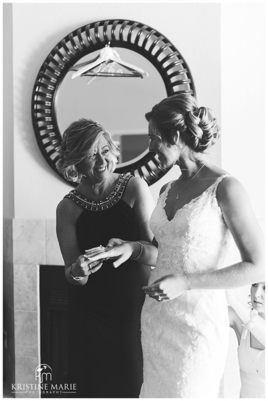 Mom helping bride get ready | Scripps Seaside Forum Wedding | La Jolla San Diego Wedding Photographer | Kristine Marie Photography | © www.kristinemariephotography.com