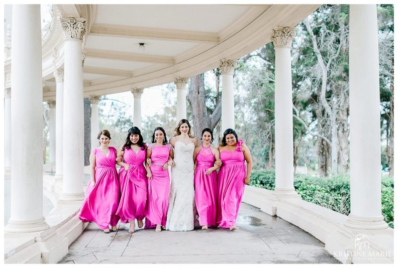 bride and bridesmaids in fuschia dress photo | Balboa Park San Diego Wedding Photographer | Kristine Marie Photography 