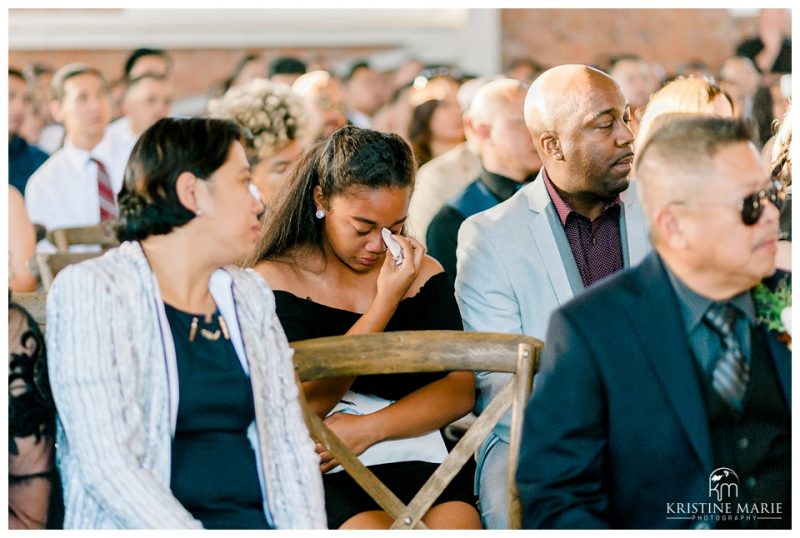 emotional candid photo of guest | BRICK Liberty Station Wedding Picture San Diego Photographer | © Kristine Marie Photography 