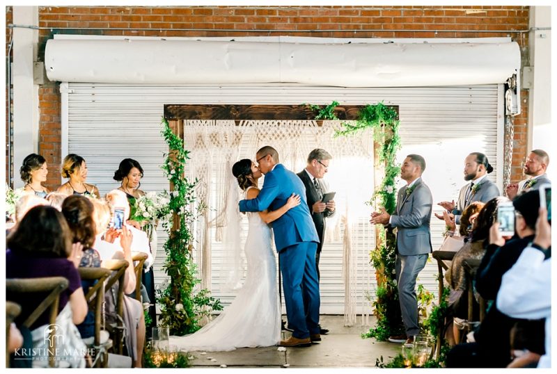bride groom first kiss | BRICK Liberty Station Wedding Picture San Diego Photographer | © Kristine Marie Photography 